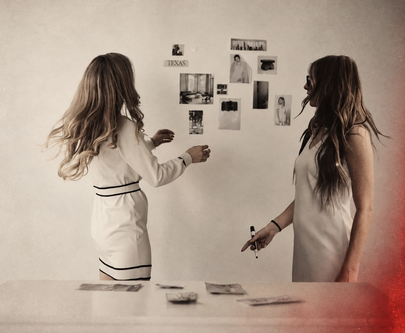 Whit Hope and Madison developing a creative direction at a wall of visual references.